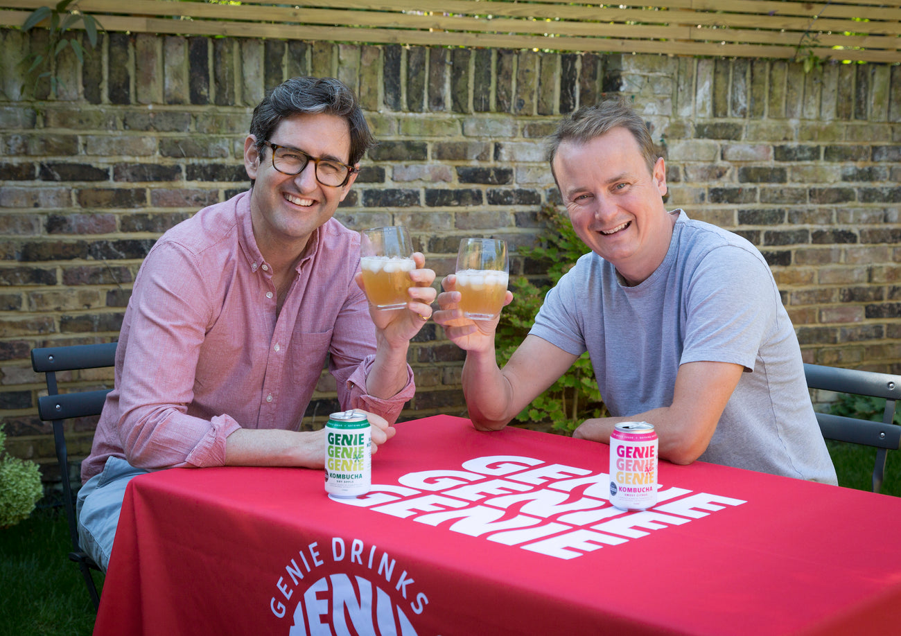 Genie logo, bottle line up and awards logo