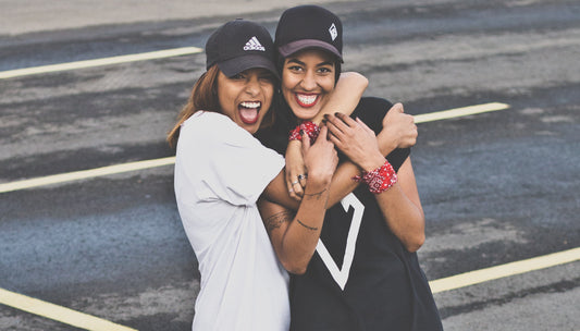 Friends/women having fun hugging each other